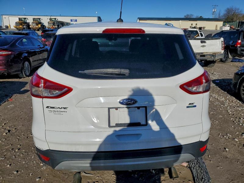 Photo 6 from auction – 2016 FORD ESCAPE SE with VIN 1FMCU9GX2GUC40402