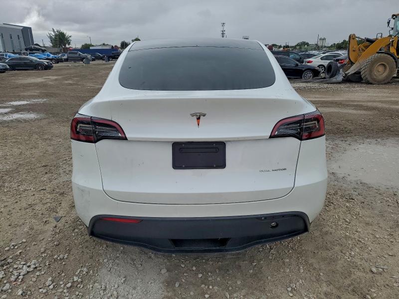 Photo 6 from auction – 2023 TESLA MODEL Y with VIN 7SAYGAEE4PF898450