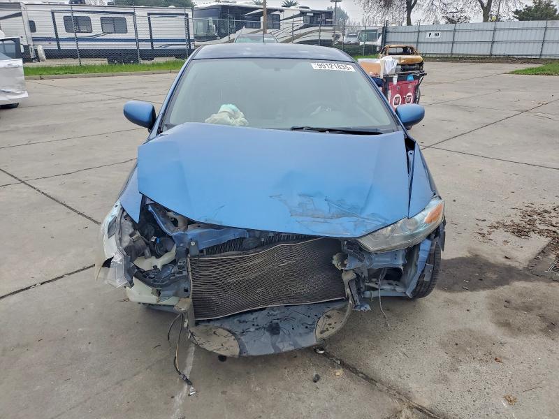 Photo 5 from auction – 2010 HONDA INSIGHT LX with VIN JHMZE2H51AS030763