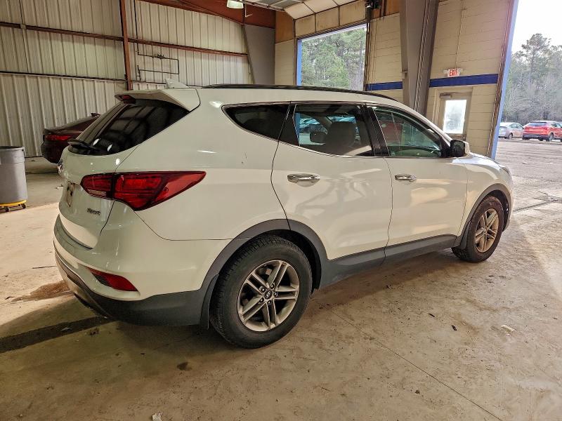 Photo 3 from auction – 2017 HYUNDAI SANTA FE S with VIN 5NMZU3LB0HH042576