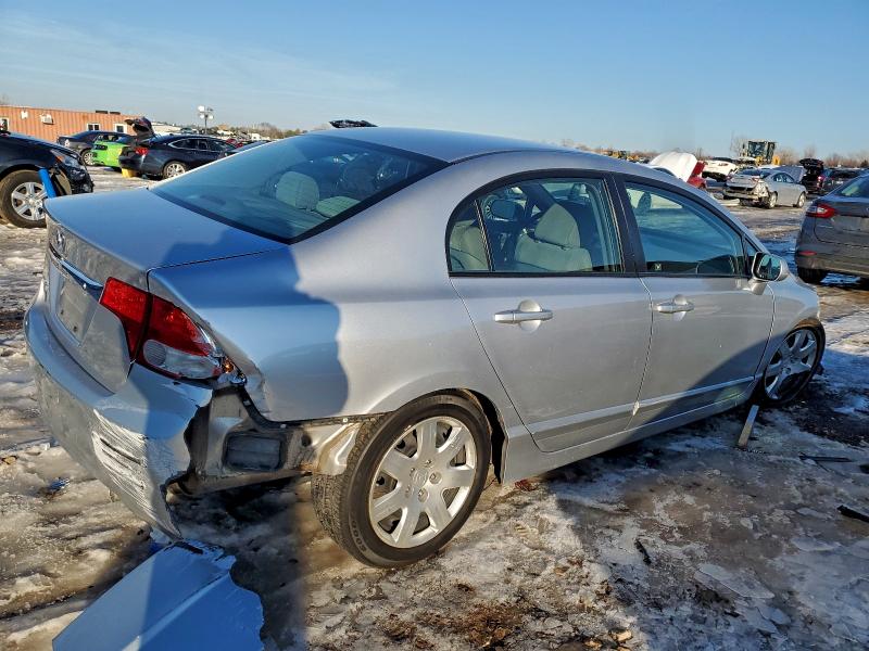 Foto 3 de la subasta – 2010 HONDA CIVIC LX con VIN 19XFA1F52AE053839