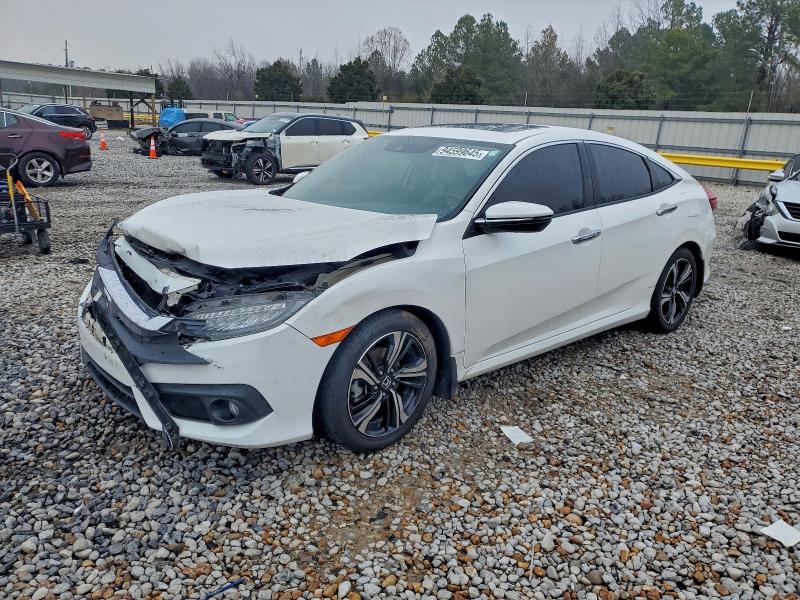 HONDA CIVIC TOUR 2017 with VIN 19XFC1F91HE031208 - Photo from auction