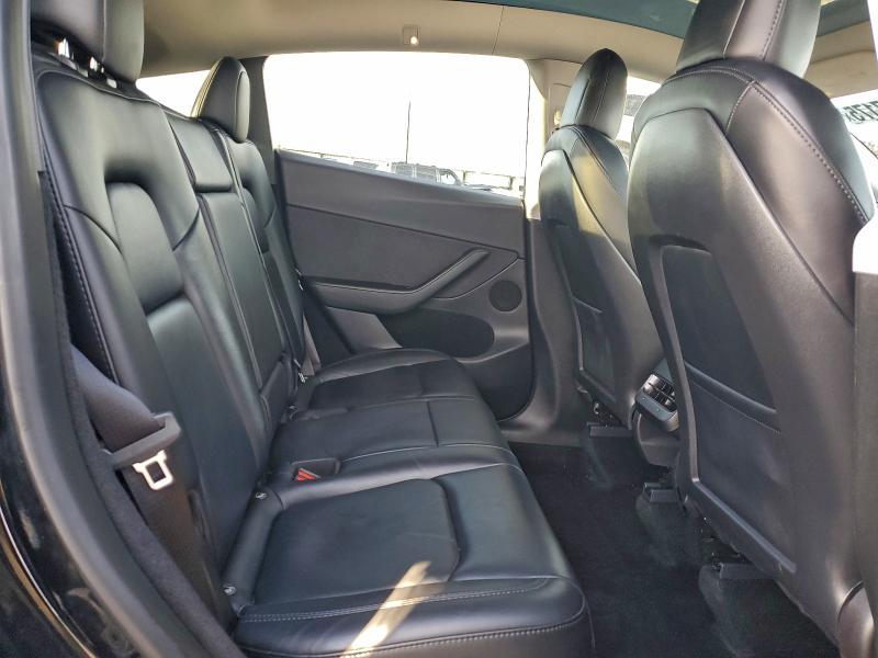 Photo 11 from auction – 2023 TESLA MODEL Y with VIN 7SAYGDEE2PF648478