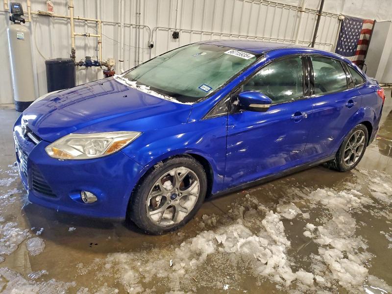 FORD FOCUS SE 2014 with VIN 1FADP3F21EL324822 - Photo from auction