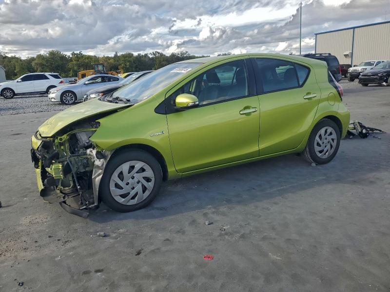TOYOTA PRIUS C 2016 with VIN JTDKDTB3XG1590699 - Photo from auction
