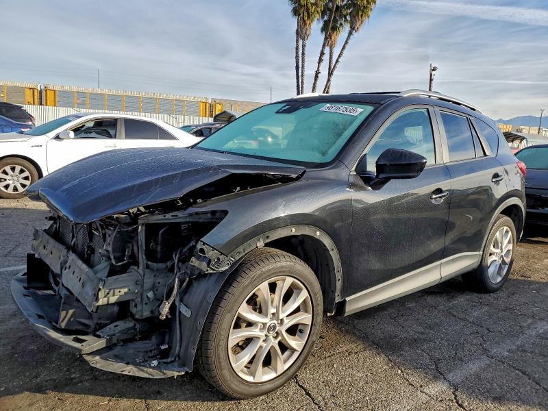 MAZDA CX-5 GT 2014 with VIN JM3KE2DY9E0357018 - Photo from auction
