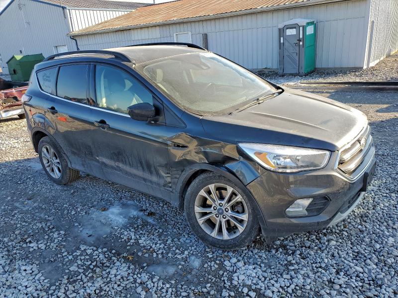 Photo 4 from auction – 2018 FORD ESCAPE SE with VIN 1FMCU9GD1JUD06578