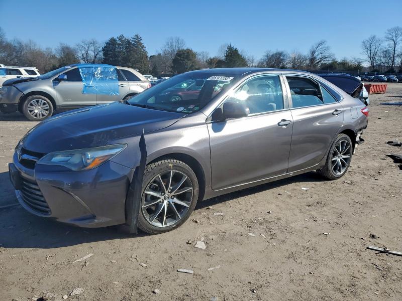 TOYOTA CAMRY 2015 with VIN 4T1BF1FK0FU989775 - Photo from auction