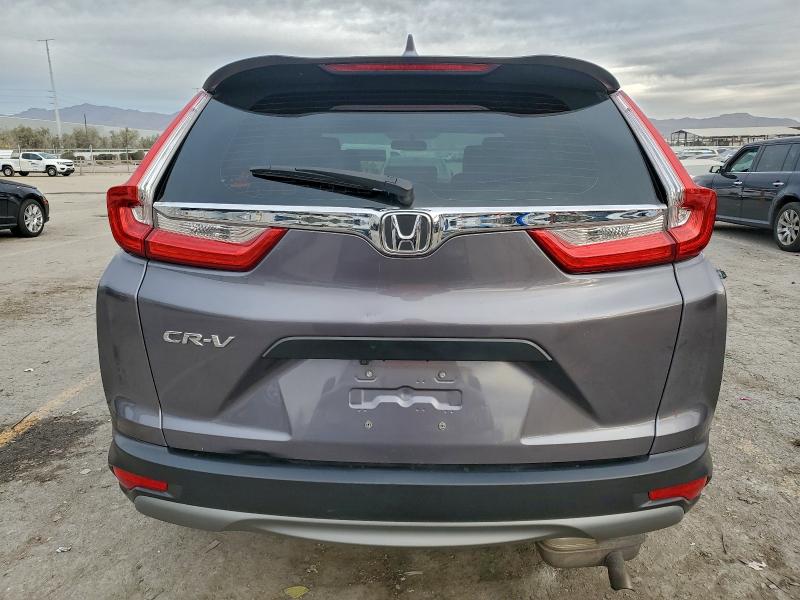 Photo 6 from auction – 2017 HONDA CR-V LX with VIN 7FARW5H37HE007627
