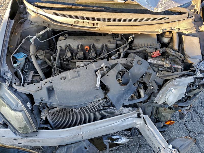 Photo 11 from auction – 2014 HONDA CIVIC LX with VIN 19XFB2F53EE006599