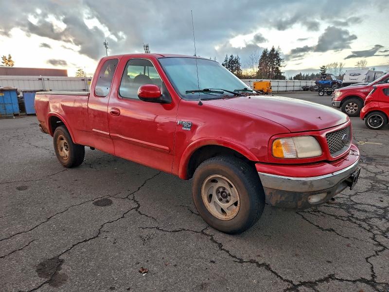 Photo 4 from auction – 2001 FORD F150 XL with VIN 1FTRX18L01KF05940