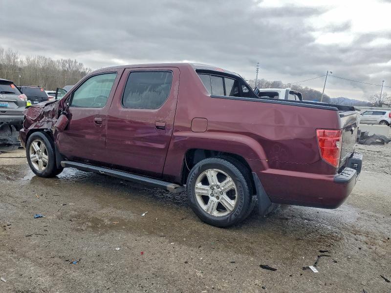 Photo 2 from auction – 2010 HONDA RIDGELINE with VIN 5FPYK1F58AB011523