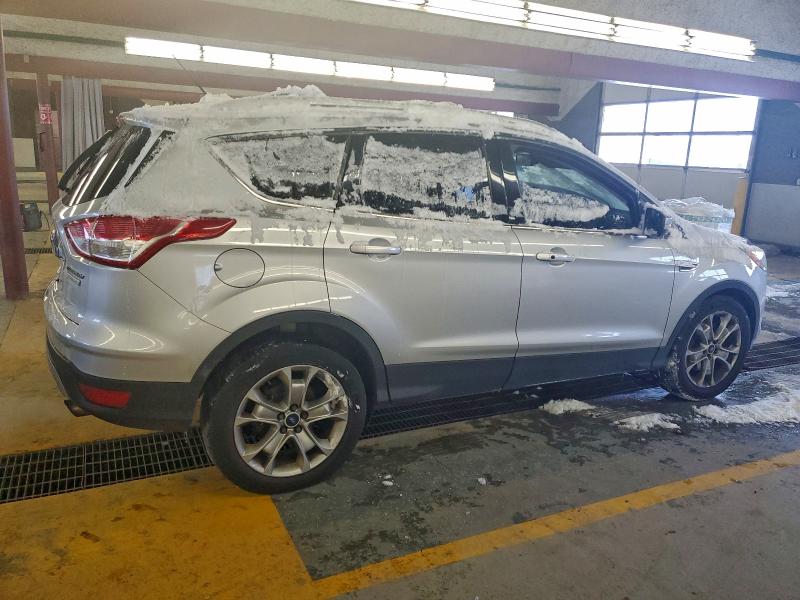 Photo 3 from auction – 2014 FORD ESCAPE TIT with VIN 1FMCU0J90EUB24716