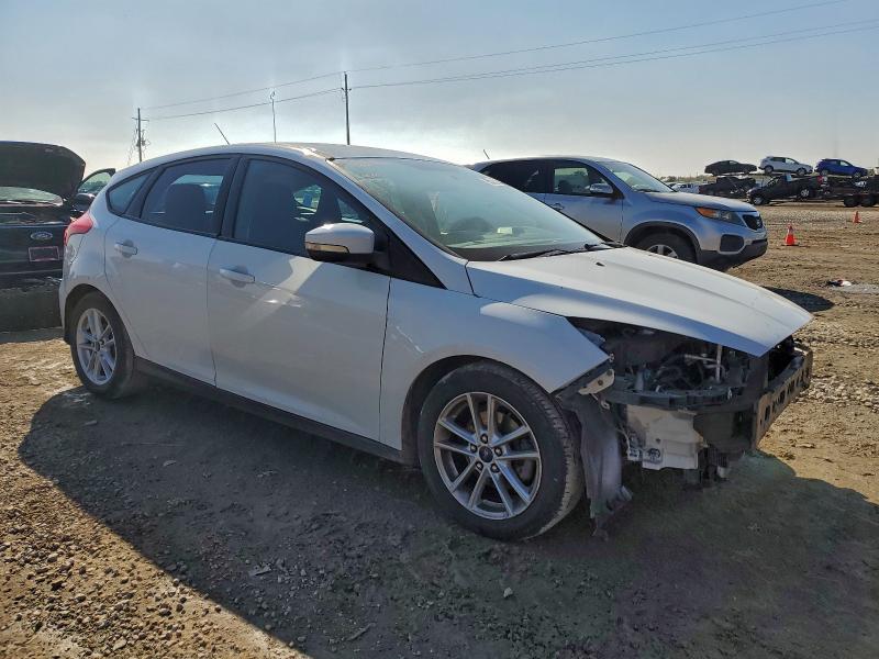 Foto 4 de la subasta – 2015 FORD FOCUS SE con VIN 1FADP3K24FL223491