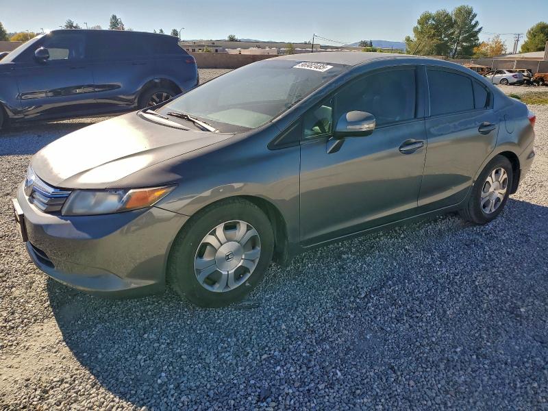 HONDA CIVIC HYBR 2012 with VIN JHMFB4F31CS001663 - Photo from auction