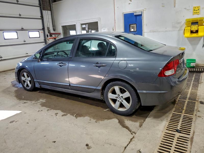 Photo 2 from auction – 2010 HONDA CIVIC LX with VIN 19XFA1F59AE001625