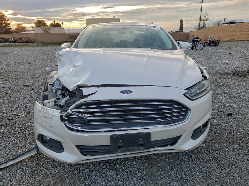 Photo 5 from auction – 2016 FORD FUSION SE with VIN 3FA6P0LU7GR166178