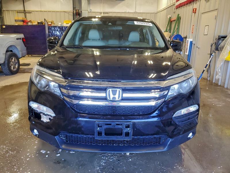 Photo 5 from auction – 2018 HONDA PILOT EX with VIN 5FNYF6H43JB066170