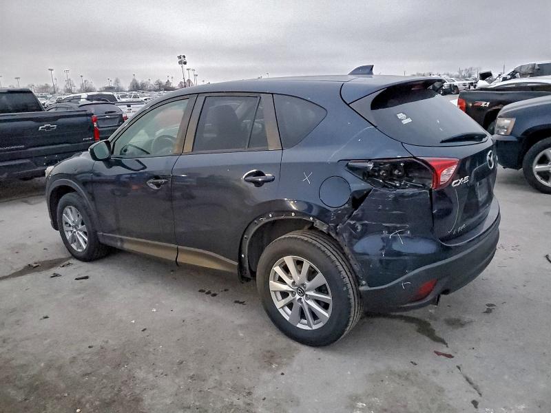 Photo 2 from auction – 2015 MAZDA CX-5 TOURI with VIN JM3KE2CYXF0549633