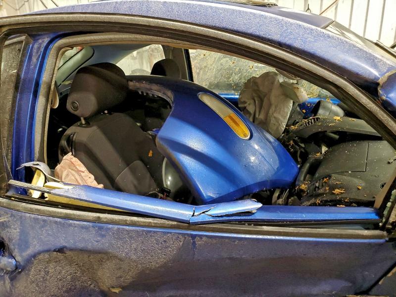 Photo 10 from auction – 2004 VOLKSWAGEN NEW BEETLE with VIN 3VWCK31C54M406440
