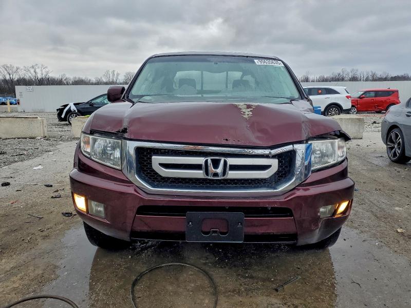 Photo 5 from auction – 2010 HONDA RIDGELINE with VIN 5FPYK1F58AB011523