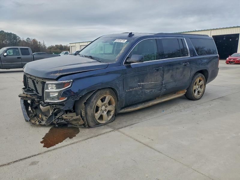 CHEVROLET SUBURBAN 2019 with VIN 1GNSCHKC7KR124682 - Photo from auction