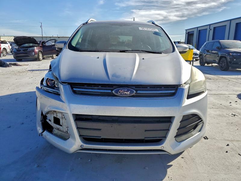 Photo 5 from auction – 2014 FORD ESCAPE TIT with VIN 1FMCU9JX2EUA33658