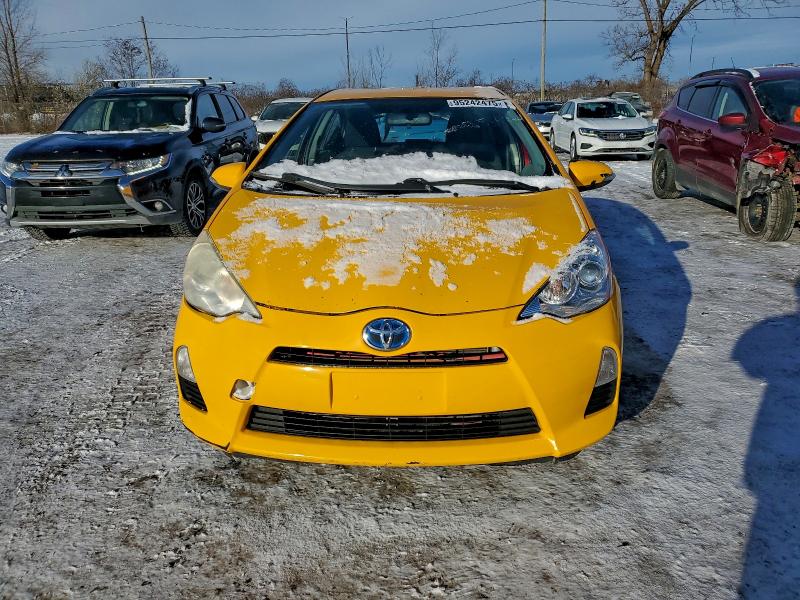 Photo 5 from auction – 2014 TOYOTA PRIUS C with VIN JTDKDTB35E1559373