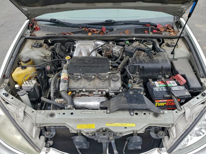 Photo 11 from auction – 2002 TOYOTA CAMRY LE with VIN JTDBF30K020052550