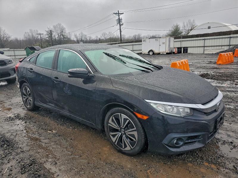 Photo 4 from auction – 2016 HONDA CIVIC EXL with VIN 19XFC1F7XGE210067