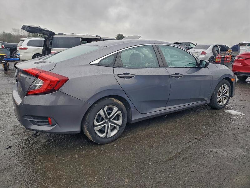 Photo 3 from auction – 2016 HONDA CIVIC LX with VIN 2HGFC2F58GH554491