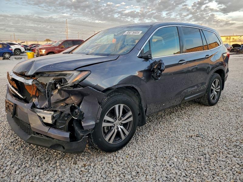 HONDA PILOT 2016 with VIN 5FNYF5H55GB027625 - Photo from auction