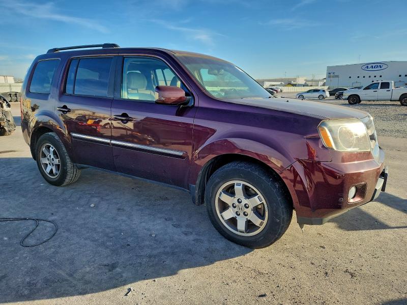 Foto 4 de la subasta – 2011 HONDA PILOT TOUR con VIN 5FNYF4H99BB095724