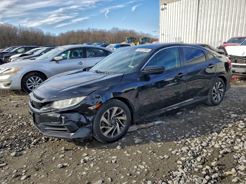 HONDA CIVIC EX 2018 with VIN 19XFC2F79JE201986 - Photo from auction