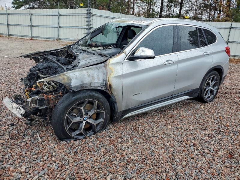 BMW X1 XDRIVE2 2017 with VIN WBXHT3C31H5F86150 - Photo from auction