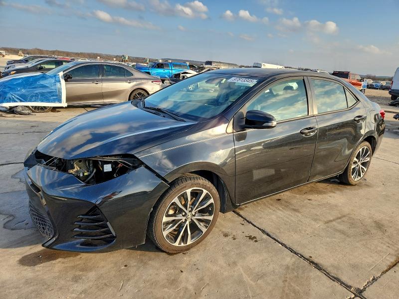 TOYOTA COROLLA L 2017 with VIN 5YFBURHE9HP692620 - Photo from auction