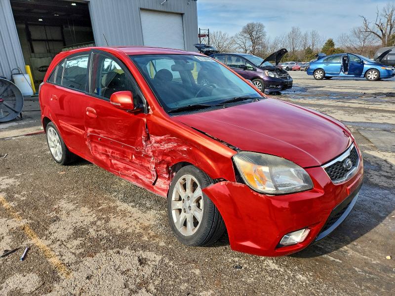 Photo 4 from auction – 2010 KIA RIO LX with VIN KNADH5A31A6659118