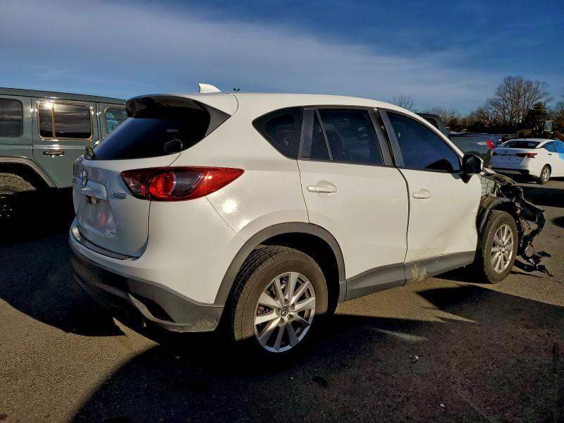 Photo 3 from auction – 2015 MAZDA CX-5 SPORT with VIN JM3KE2BE2F0472926
