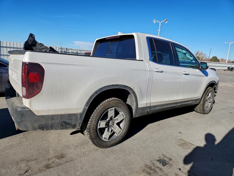 Photo 3 from auction – 2024 HONDA RIDGELINE with VIN 5FPYK3F56RB005016