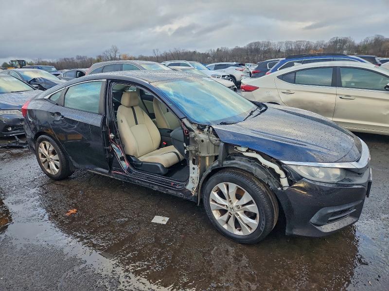 Photo 4 from auction – 2017 HONDA CIVIC LX with VIN 19XFC2F57HE200182