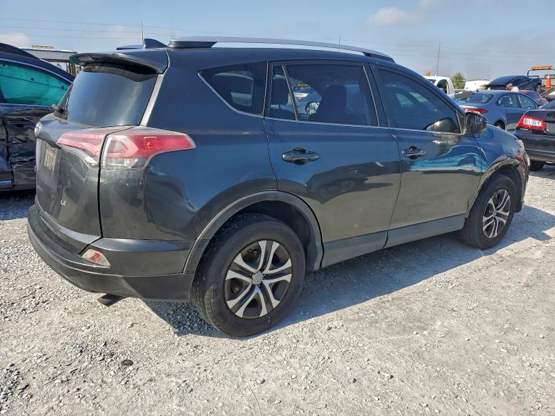 Photo 3 from auction – 2016 TOYOTA RAV4 LE with VIN JTMZFREV6GD091308