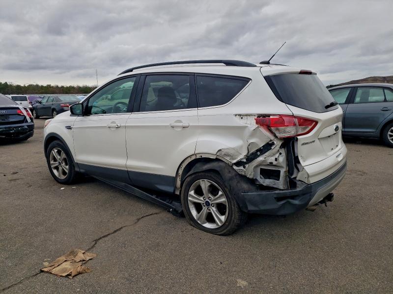 Photo 2 from auction – 2016 FORD ESCAPE SE with VIN 1FMCU9GX1GUA25156