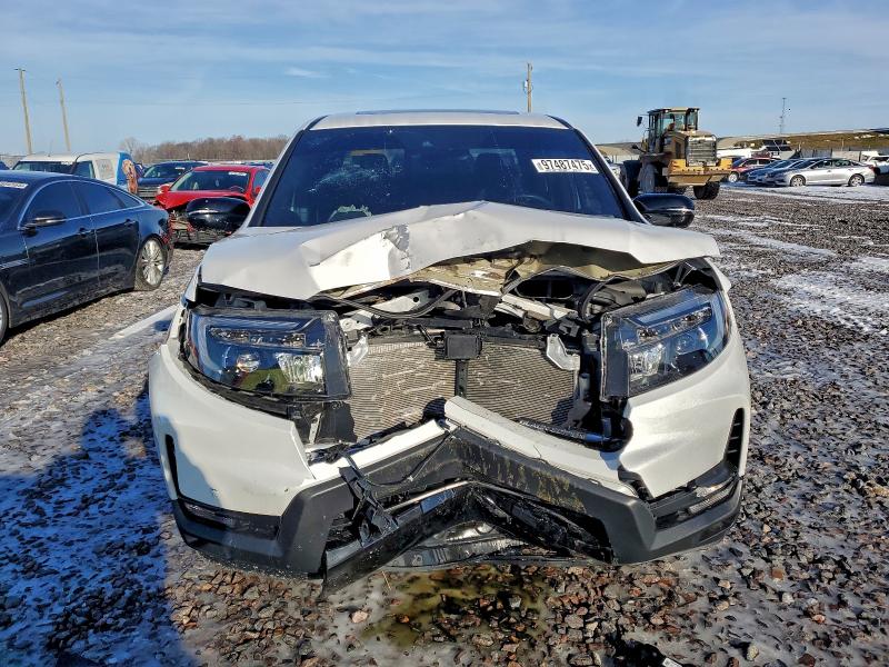 Photo 5 from auction – 2024 HONDA RIDGELINE with VIN 5FPYK3F8XRB016157