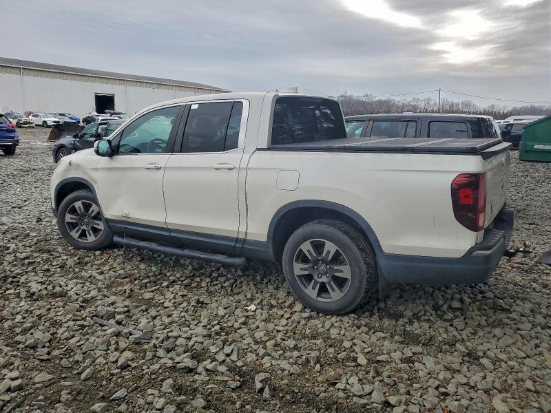 Photo 2 from auction – 2019 HONDA RIDGELINE with VIN 5FPYK3F67KB002317