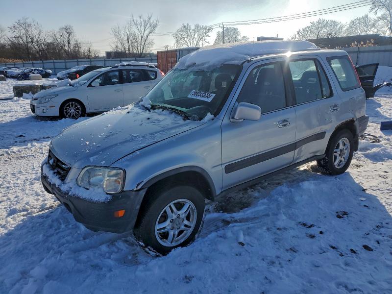 HONDA CR-V EX 2000 with VIN JHLRD1869YC035031 - Photo from auction
