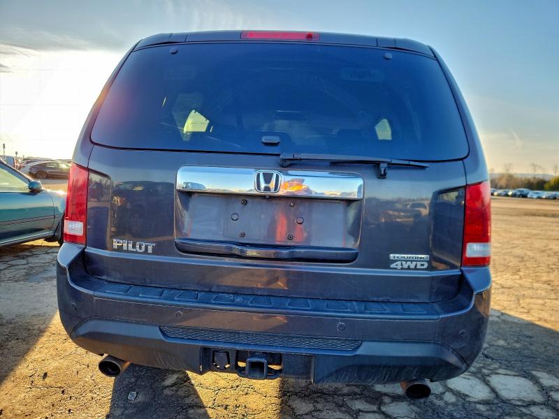 Фото 6 с аукциона – 2012 HONDA PILOT TOUR с VIN 5FNYF4H95CB076007