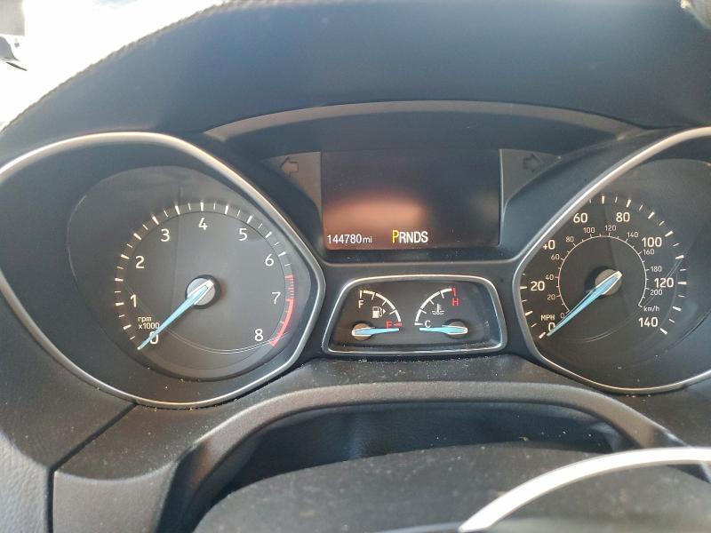 Photo 9 from auction – 2015 FORD FOCUS SE with VIN 1FADP3F27FL303779