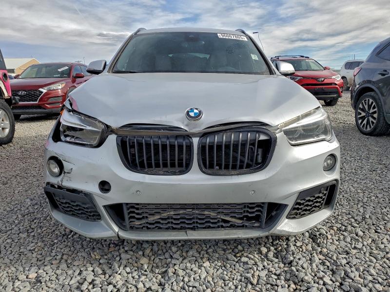 Photo 5 from auction – 2016 BMW X1 XDRIVE2 with VIN WBXHT3C37G5F64765