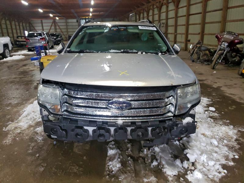 Photo 5 from auction – 2009 FORD TAURUS X S with VIN 1FMDK02W49GA06087