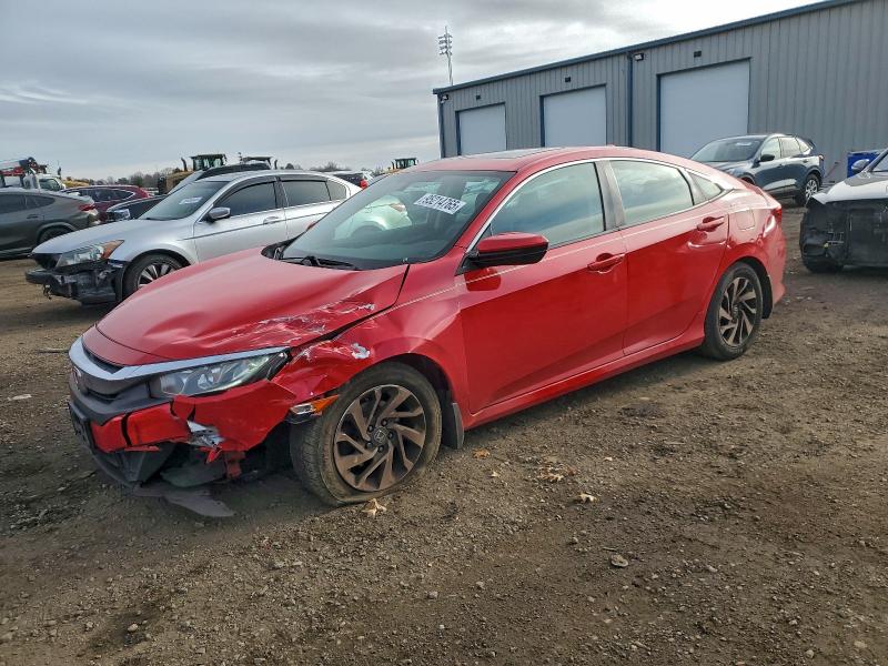 HONDA CIVIC EX 2018 with VIN 2HGFC2F76JH599115 - Photo from auction